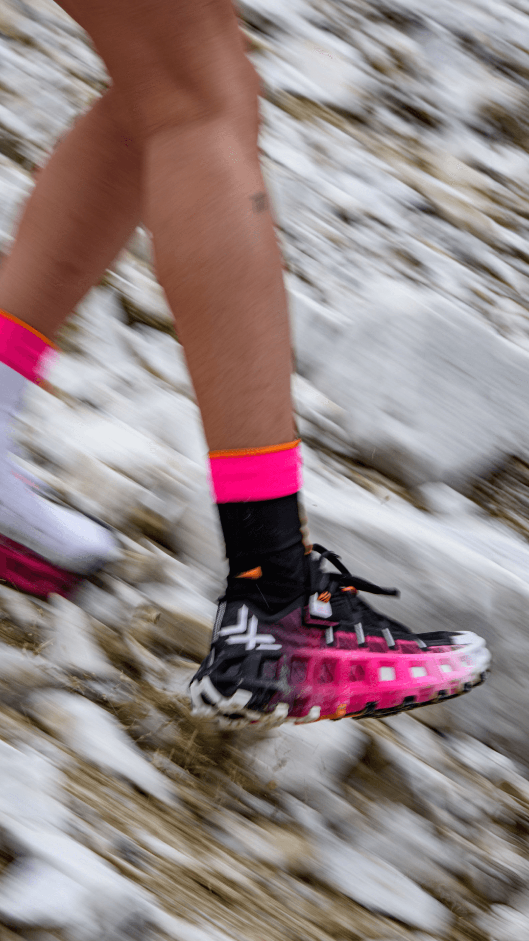 Terraskin shoes on model in action on rocky ground