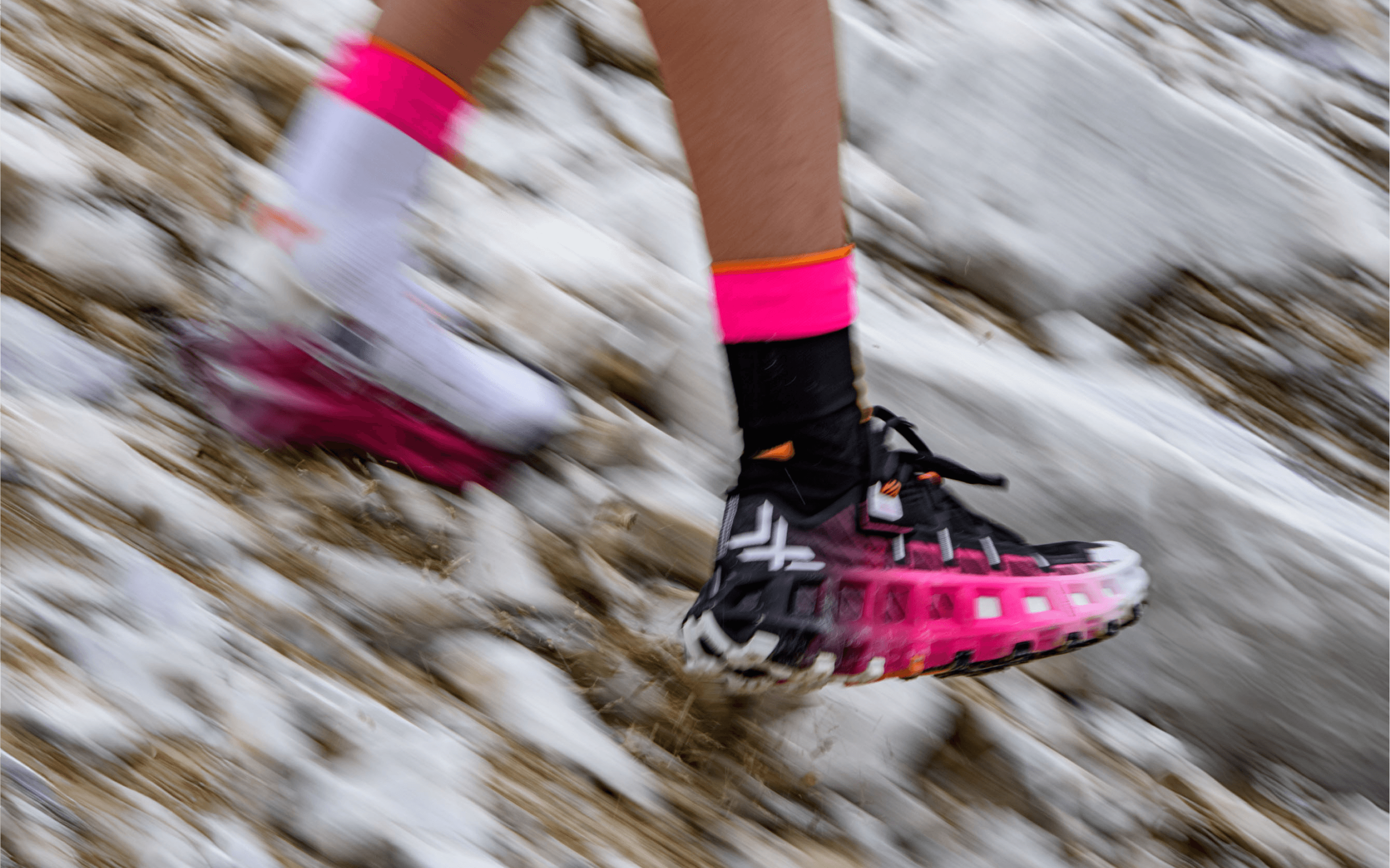 Terraskin shoes on model in action on rocky ground